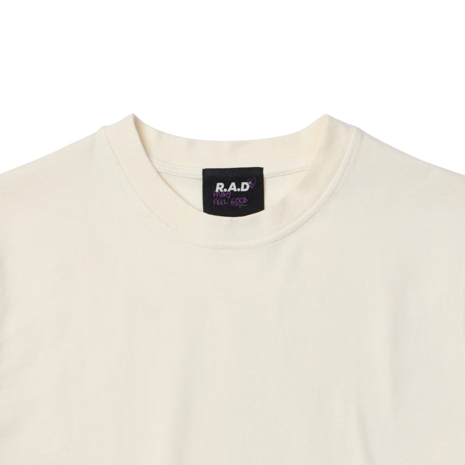 Cream-colored t-shirt.