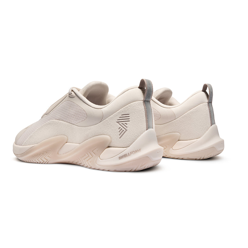 Beige athletic shoes.