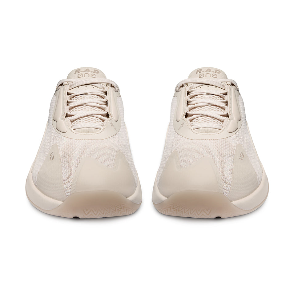 Pair of beige athletic shoes from R.A.D® ONE V2 CRYSTAL GRAY product line