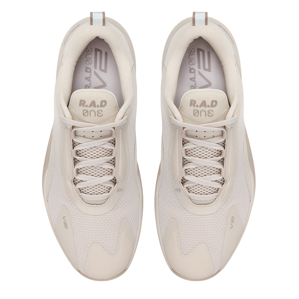Pair of beige athletic shoes.