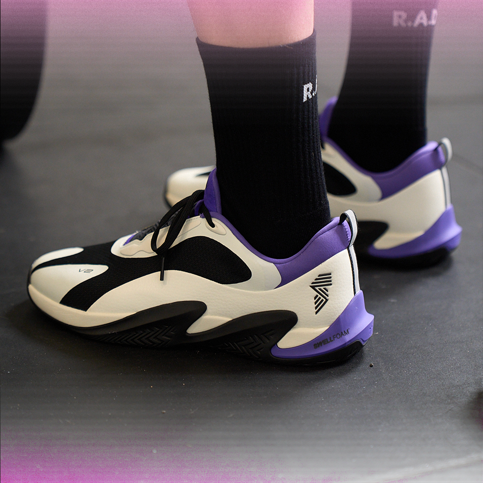 Black, white, and purple athletic shoes.