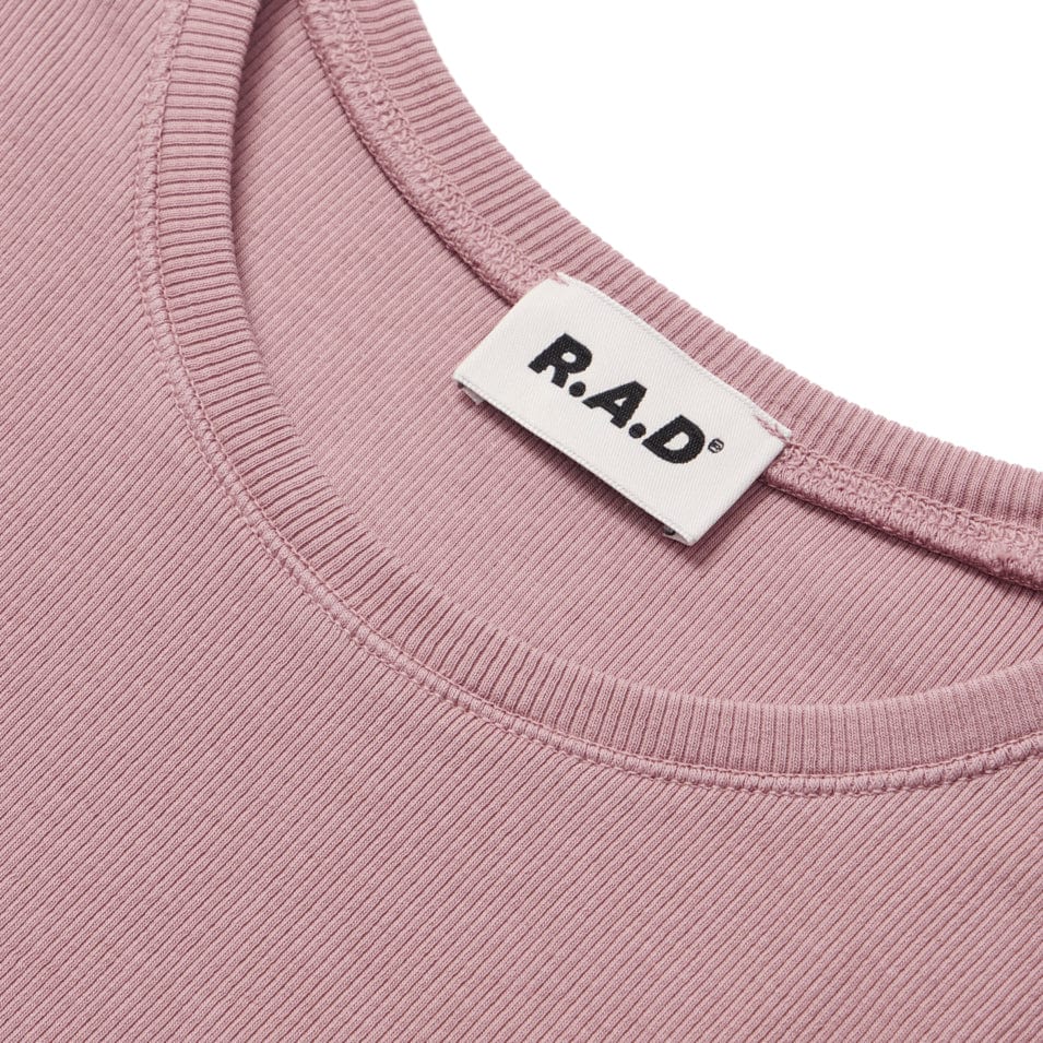 Mauve ribbed knit top.