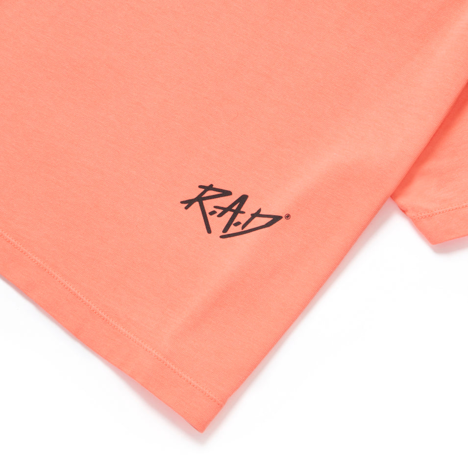 Salmon-colored shirt from SKETCH CROP FLUORO ORANGE product line