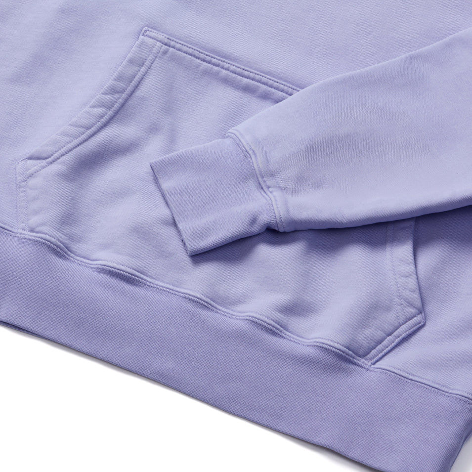 Lavender-colored sweatshirt with a kangaroo pocket and ribbed cuffs.