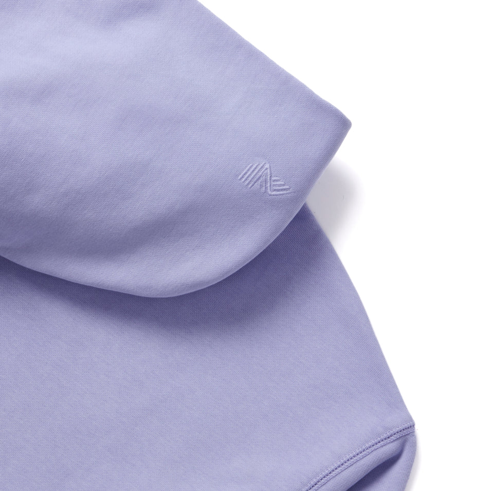 Light purple dress shirt collar with a small embroidered logo.