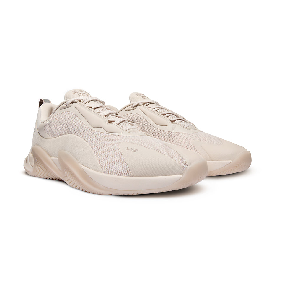 Beige athletic sneakers.