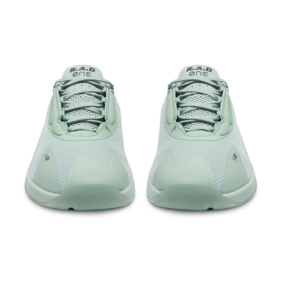 Two light green athletic shoes.