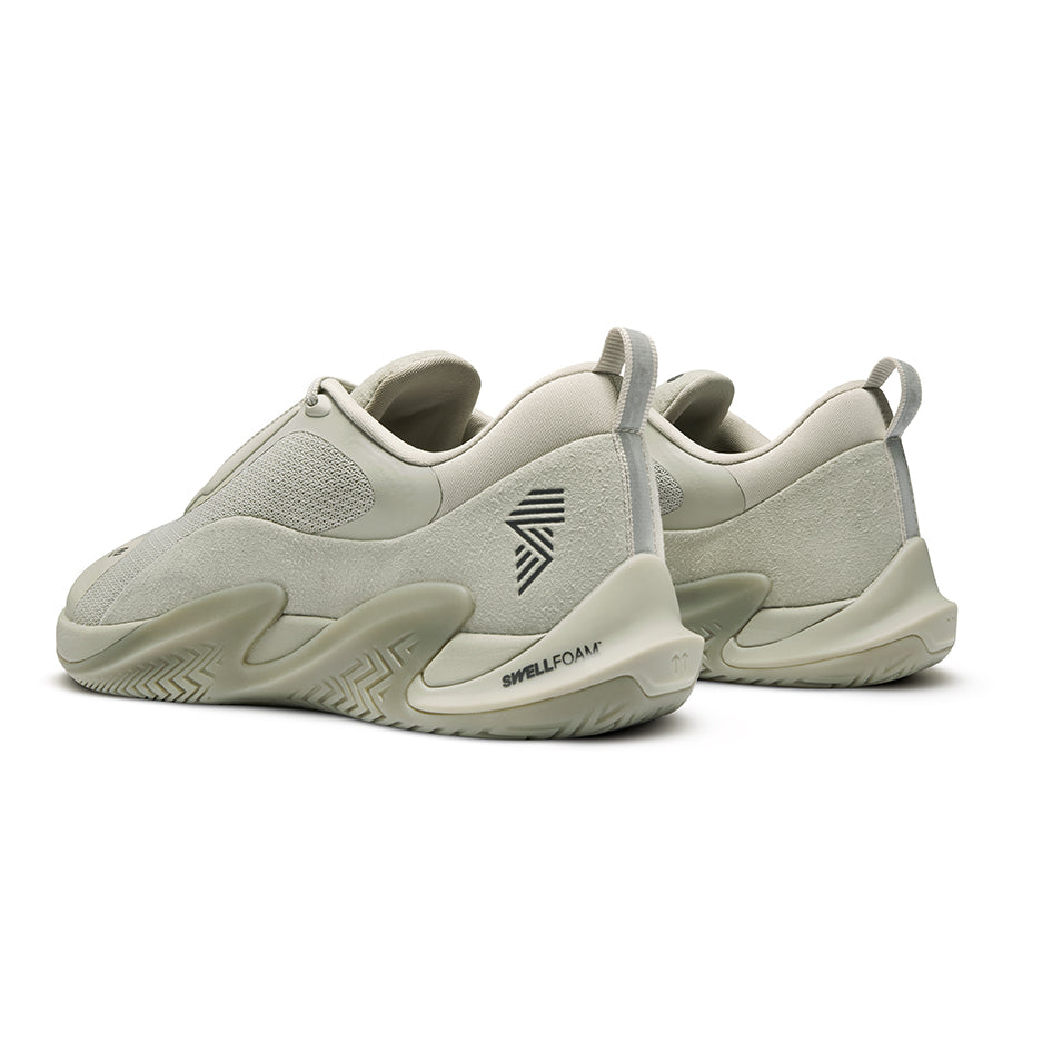 Light-colored sneakers from the R.A.D® ONE V2 DUST GREEN collection