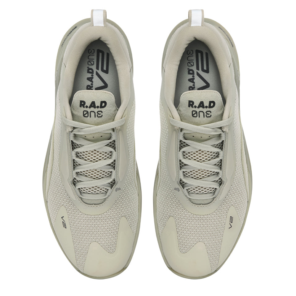 Pair of beige running shoes.