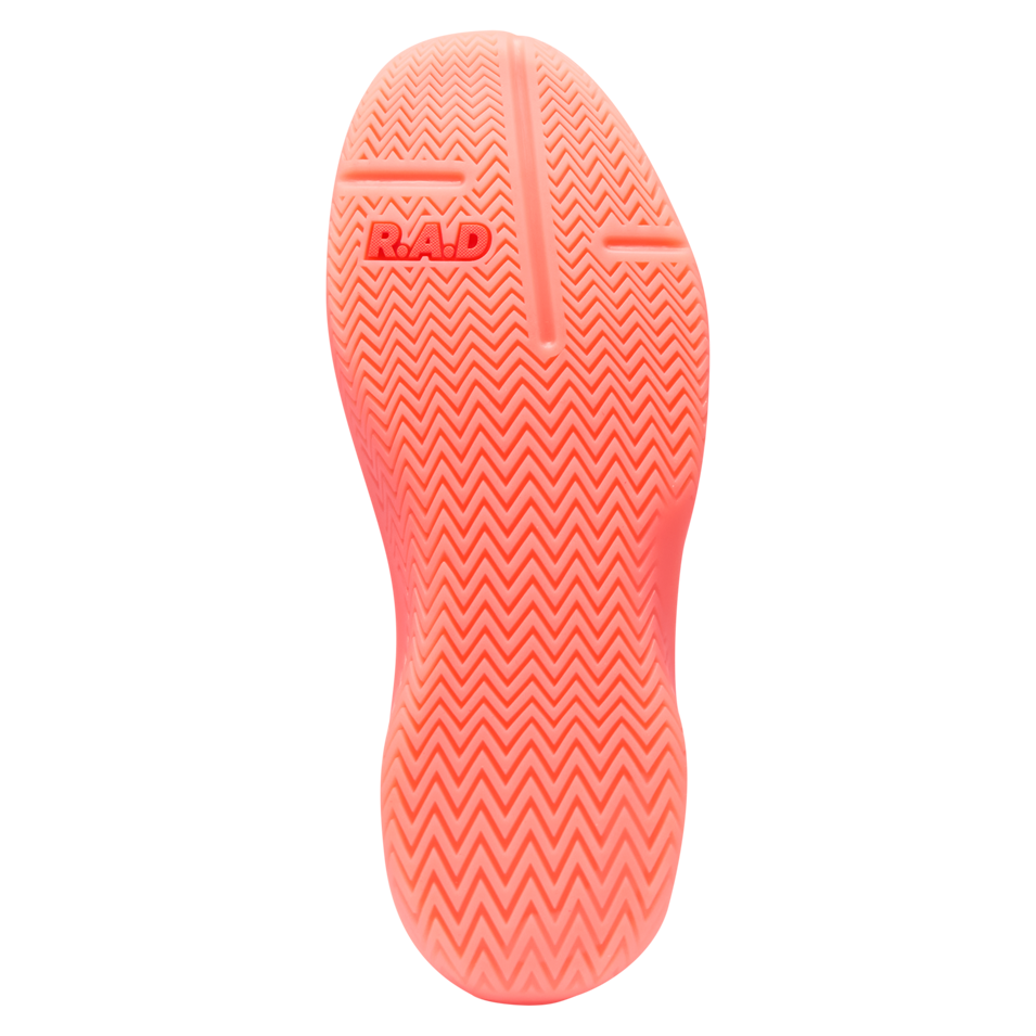 Coral-colored shoe sole with chevron pattern from R.A.D® ONE V2 FLOWER BLUSH collection