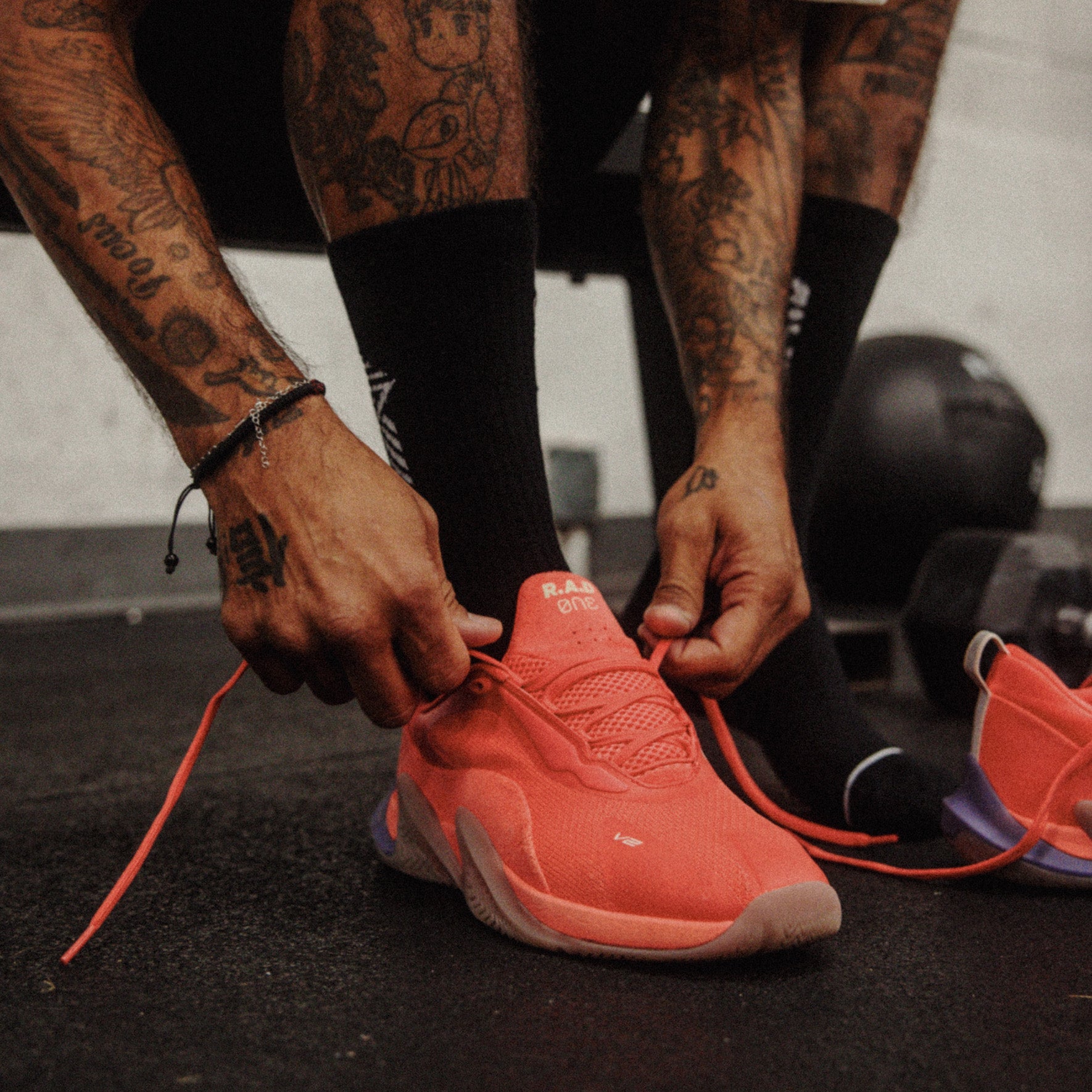 Coral-colored athletic shoe tied, R.A.D® ONE V2 HOT CORAL product image