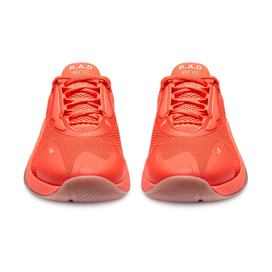 Pair of R.A.D® ONE V2 HOT CORAL orange athletic shoes for active sportswear