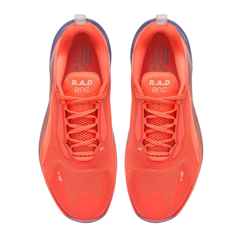 Pair of orange running shoes.