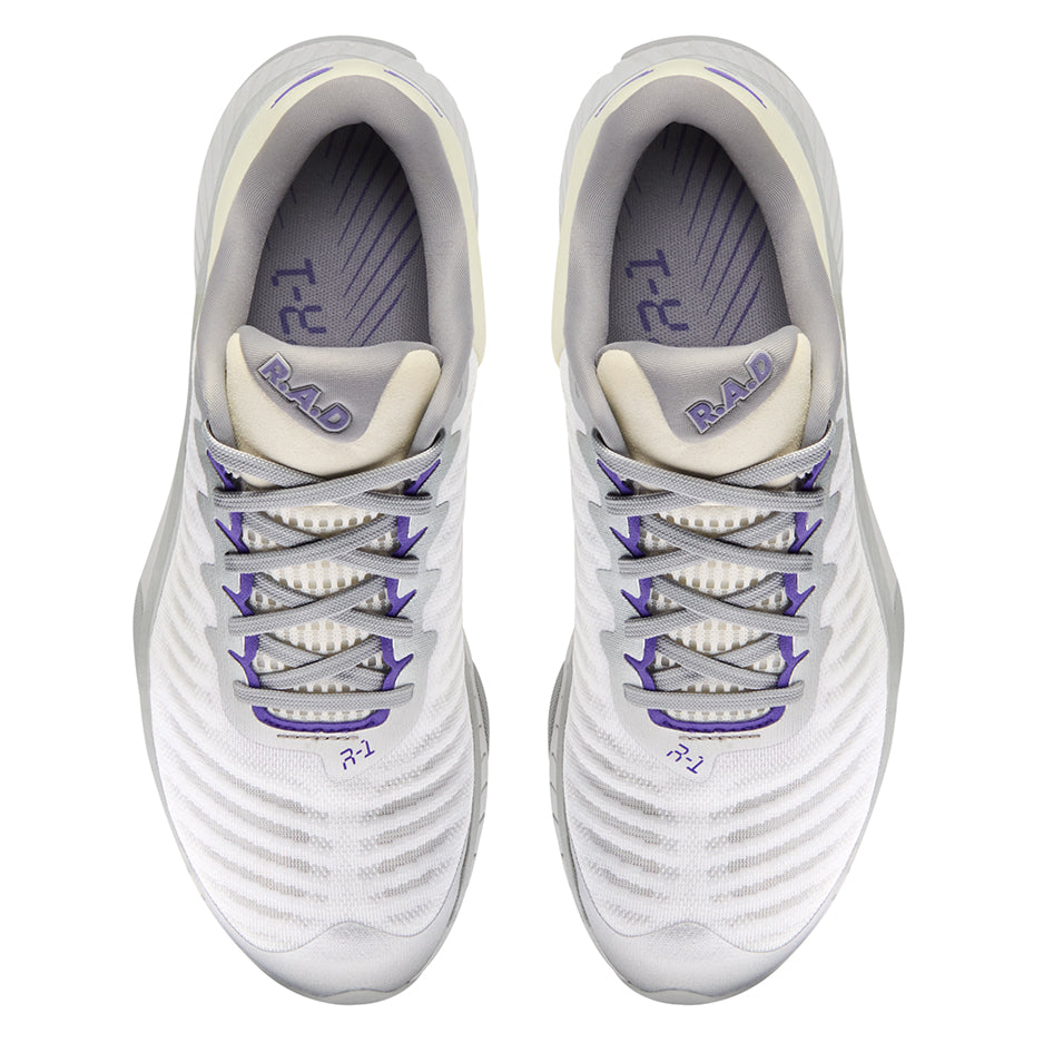 Pair of white running shoes from R.A.D R-1 Classics Purple Chrome collection