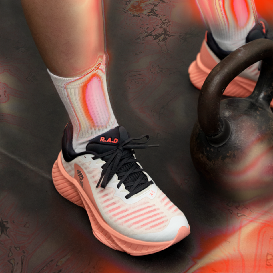 White and pink running shoe.