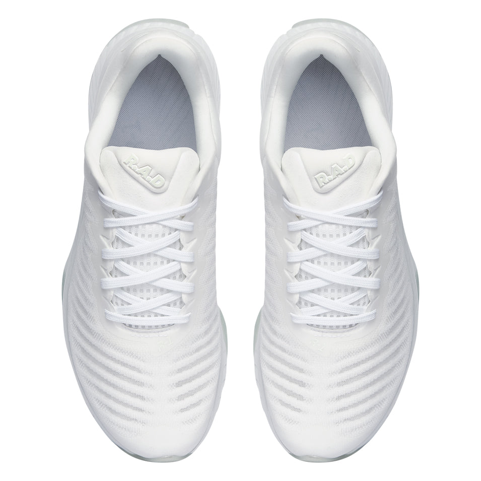 Pair of white running shoes from R.A.D R-1 GHOST collection for optimal performance