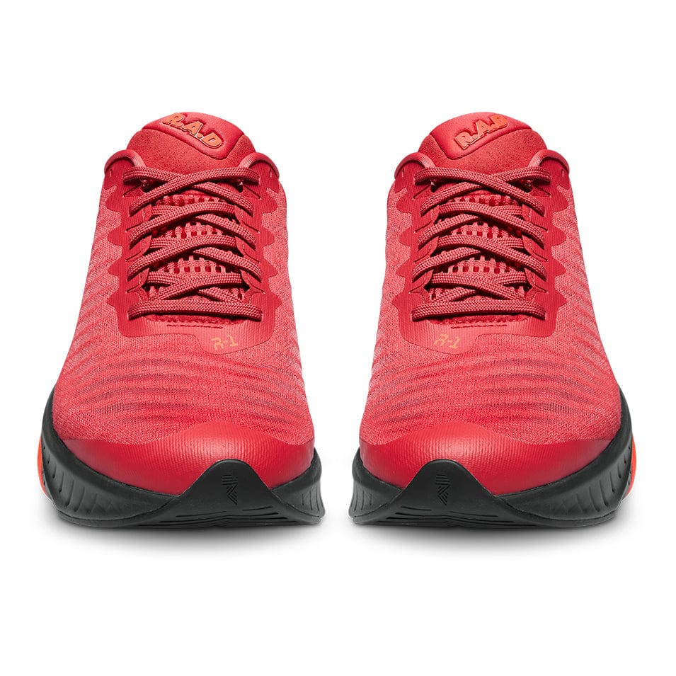 Pair of R.A.D® R-1 RED FLASH running shoes in vibrant red color for athletic performance