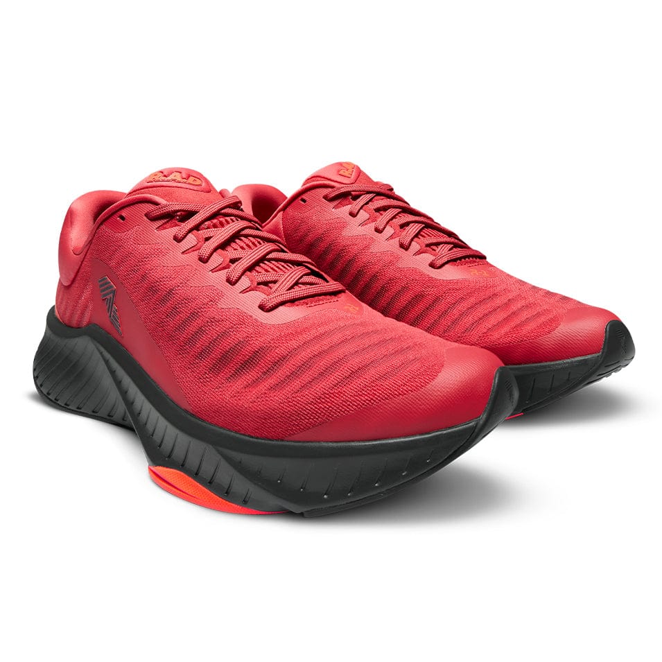Red running shoes with black soles.