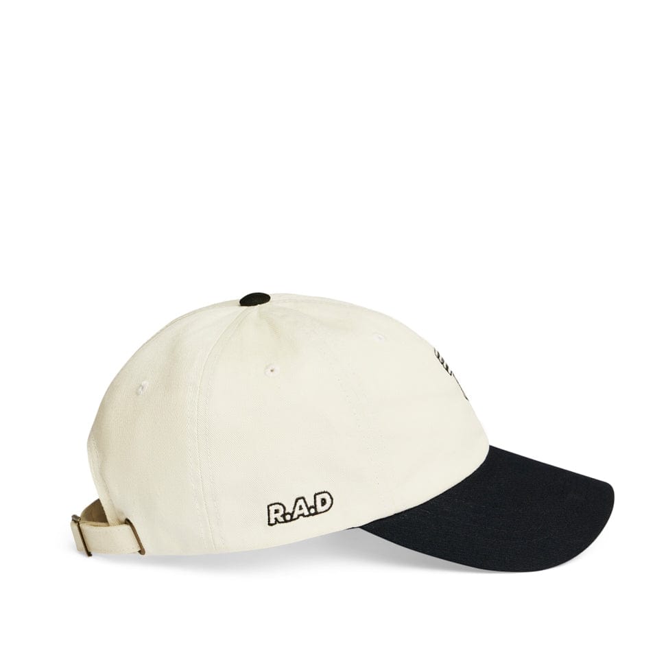 Two-tone baseball cap.