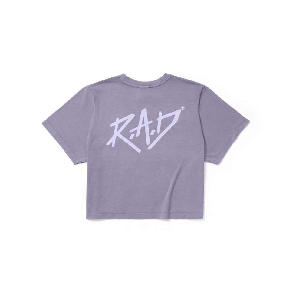 Lavender crop top with ’RAD’ graphic.